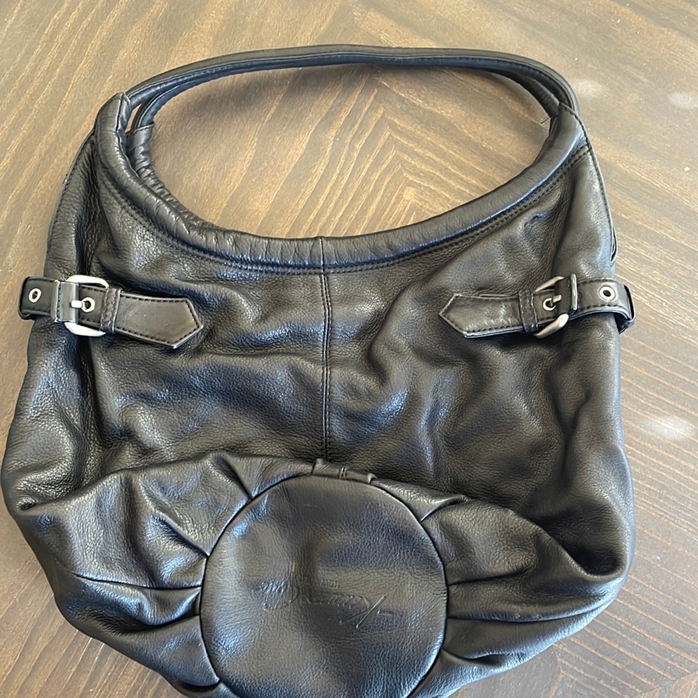 Medium sized purse. Bucket bag style. Black. Kenneth Cole.